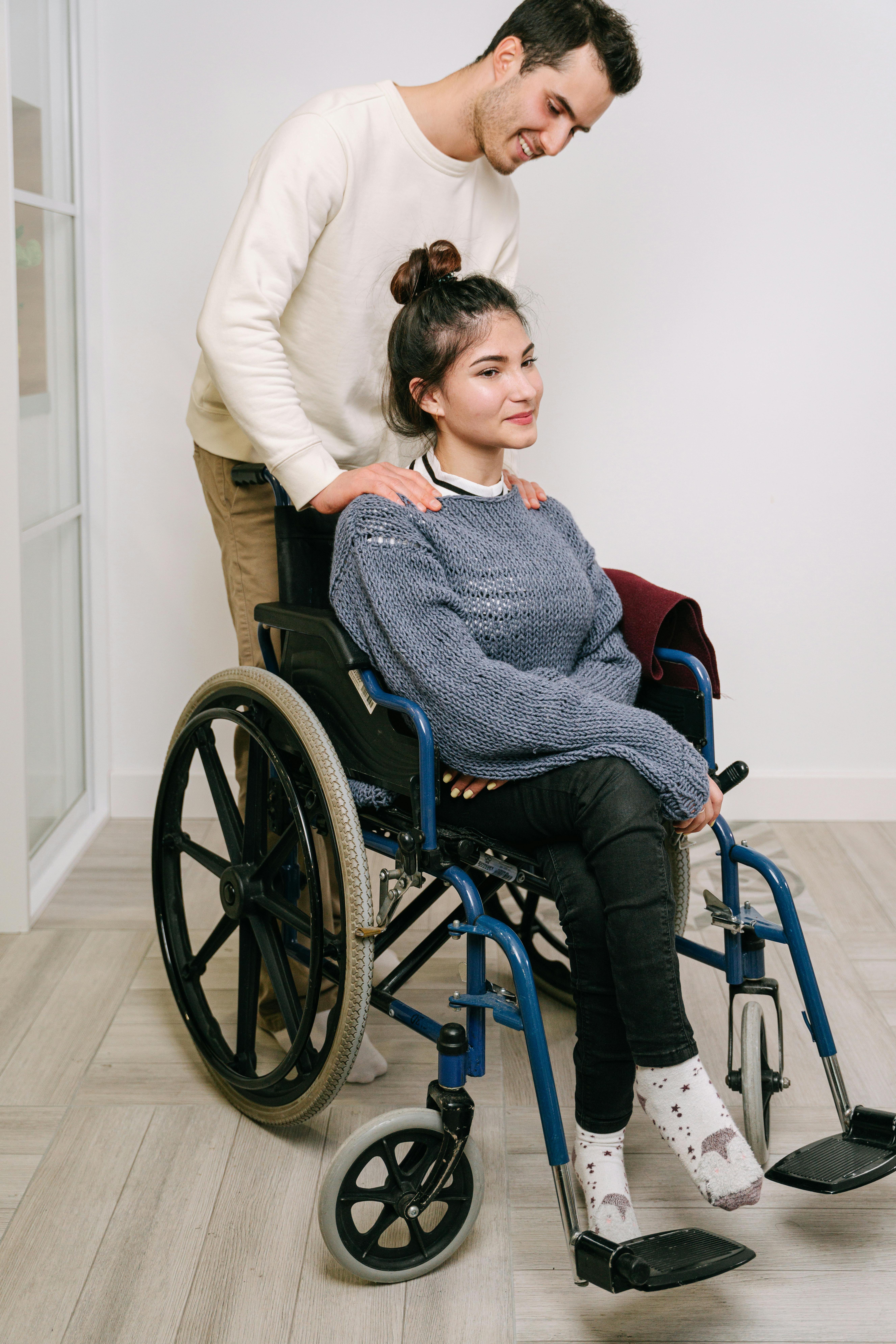 Participant and support worker outdoors